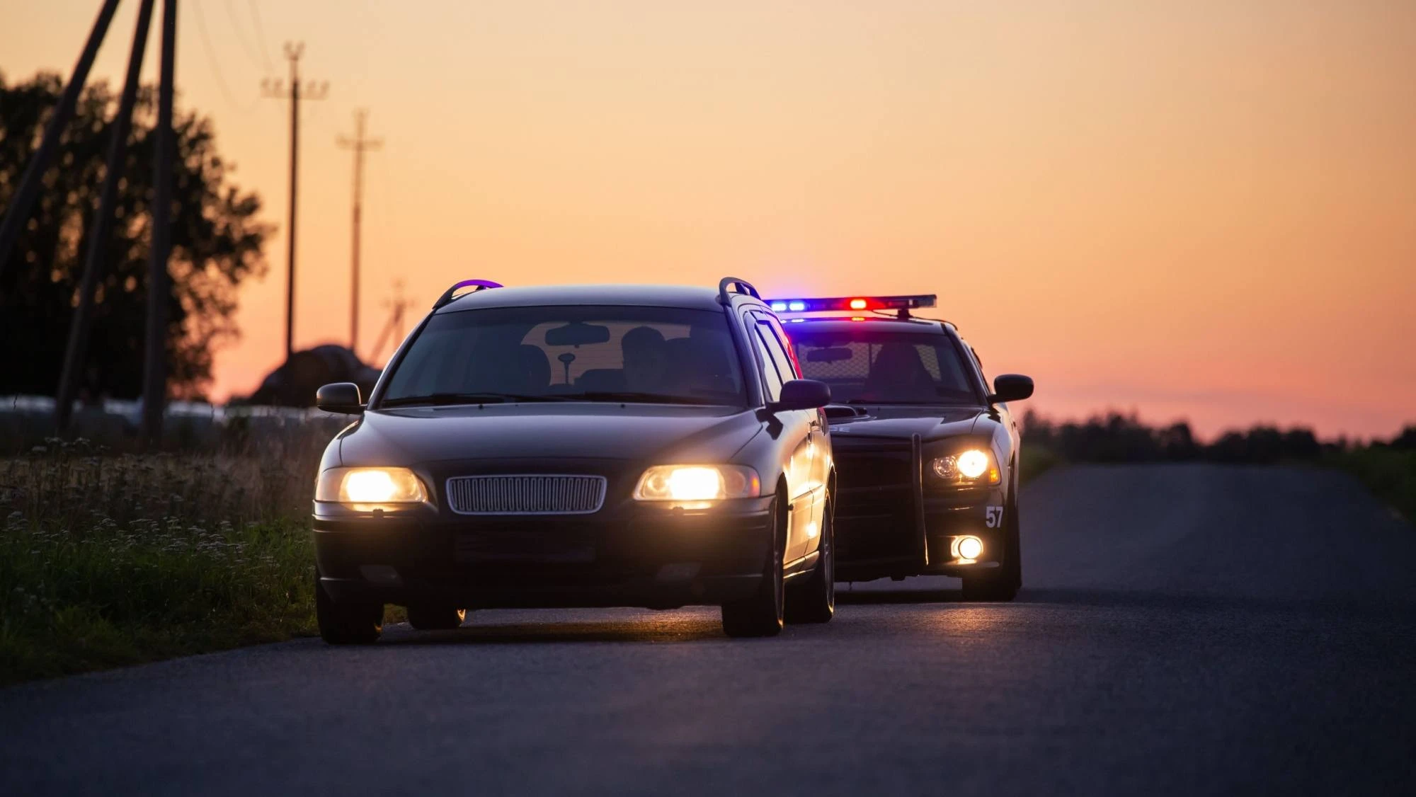 Car smuggling humans getting pulled over by the police